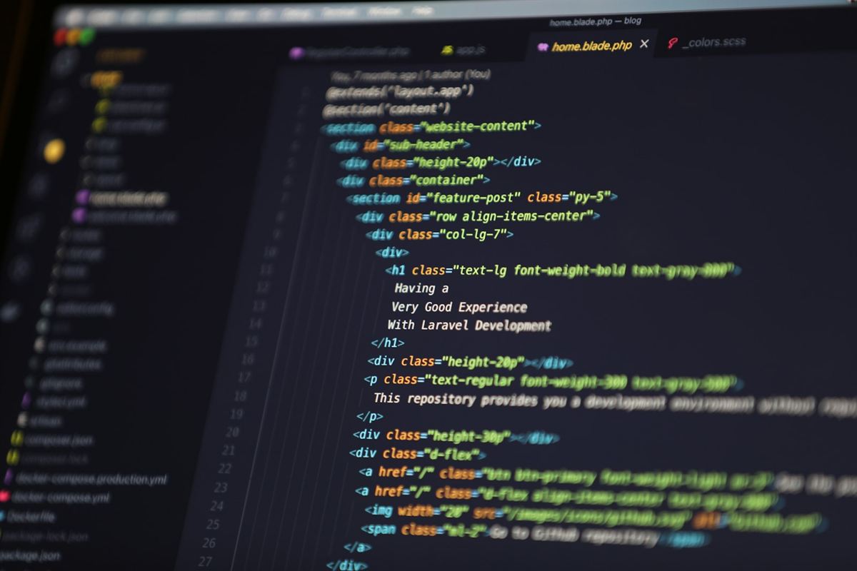Website code displayed on a computer monitor