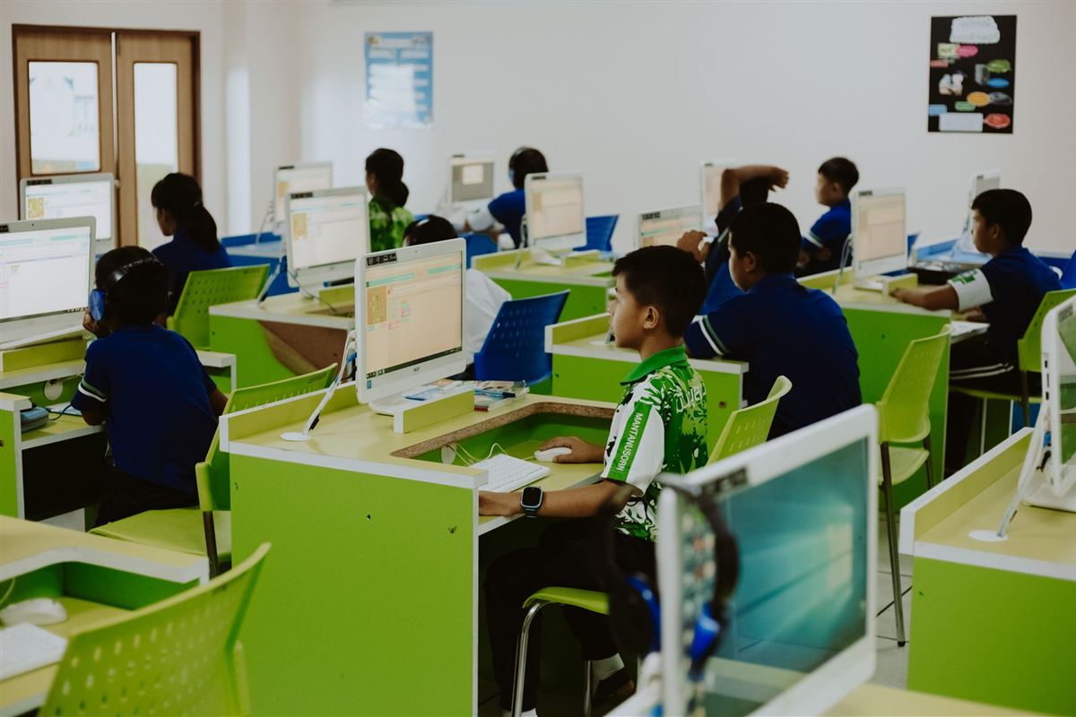 African pupils working at computers in a school computer lab